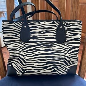 A Michael Kors never been used zebra print for animal print lovers